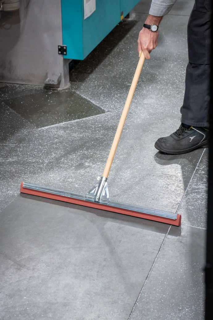 Floor squeegee with vulcan rubber cleaning factory floor